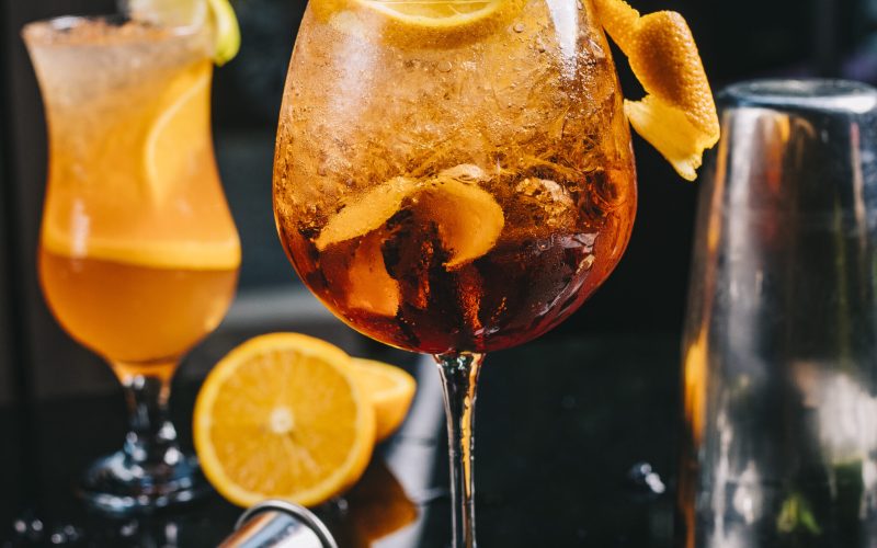 cocktail topped with orange slice